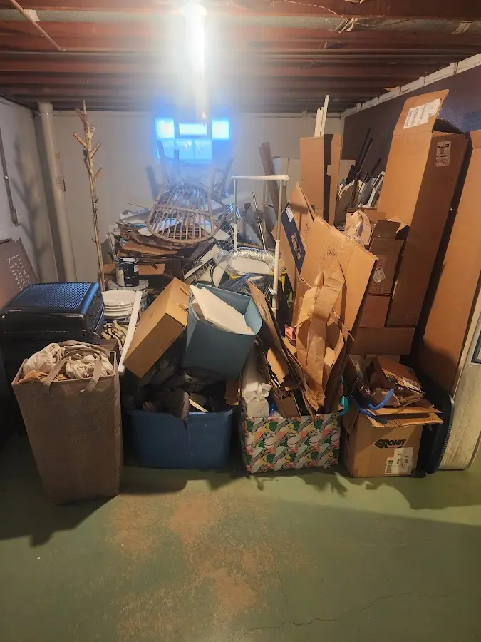 Roll-off dumpster container at job site for Yard Waste Dumpster Rental in Seaford